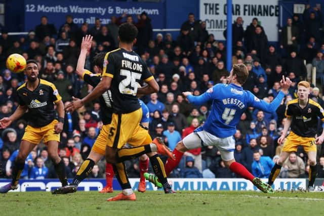 Adam Webster scores Pompey's winner against Cambridge United Picture: Joe Pepler