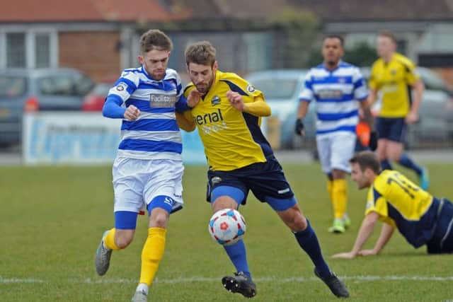 Gosport Borough defender Rory Williams. centre, right, battles for the ball with an Oxford City opponent in Saturday's 0-0 draw   Picture: Ian Hargreaves