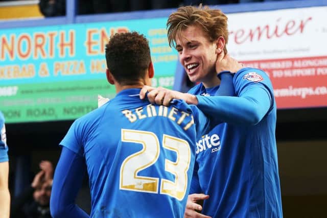 Adam Webster, right, celebrates with Kyle Bennett. Picture: Joe Pepler