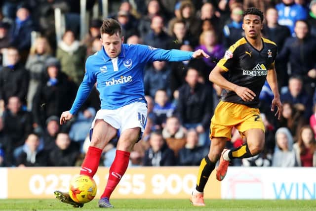 Marc McNulty scores for Pompey. Picture: Joe Pepler