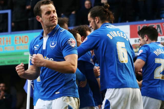 Pompey celebrate an important win. Picture: Joe Pepler