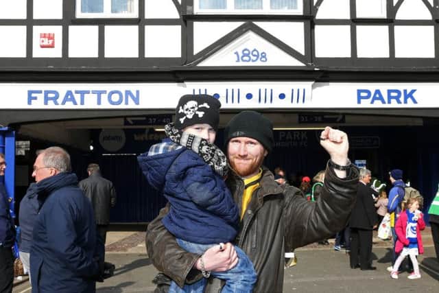 Little Liam Priday and his dad Christopher outside Fratton Park