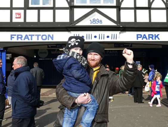 Little Liam Priday and his dad Christopher outside Fratton Park