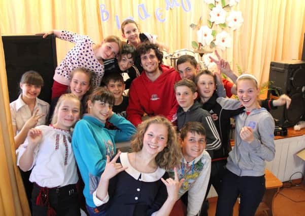 Quinn Boylan with children in Ukraine

Picture: Philip Bradshaw