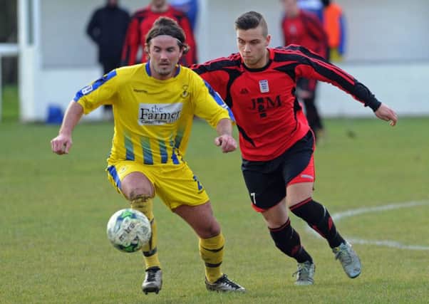 Fleetlands and Clanfield, yellow, battle it out in the Hampshire Premier League senior divison Picture: Ian Hargreaves