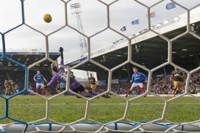 Marc McNulty scores Pompey's opener Picture: Barry Zee