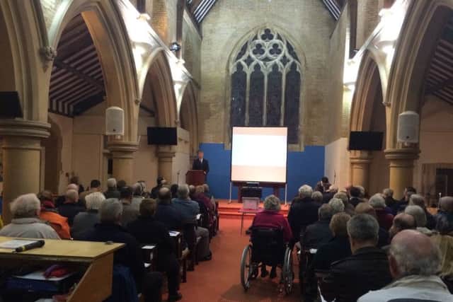 Cllr Sean Woodward addressing hundreds of residents who turned up to Holy Rood Church to hear about Hallam Land's plans for Newlands
Picture: Kimberley Barber