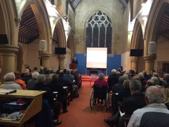 Cllr Sean Woodward addressing hundreds of residents who turned up to Holy Rood Church to hear about Hallam Land's plans for Newlands

 

Picture: Kimberley Barber