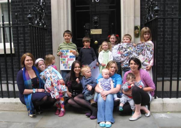 Protesters who were campaigning to save Sure Stsart cenrtes in Hampshire in 2011, pictured in outside Number 10 Downing Street