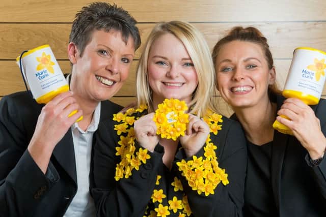 (L-r) Yorkshire Building Society colleagues Chris King, Kayleigh Batty and Lizzie Jones are backing the 'get behind the daffodil' fundraiser.      Photograph by Richard Walker/ www.imagenorth.net
