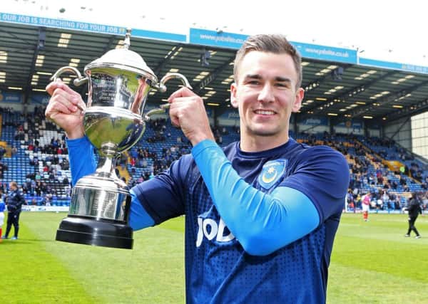 Jed Wallace lifts the Pompey player of the season trophy for 2014-15. Picture: Joe Pepler