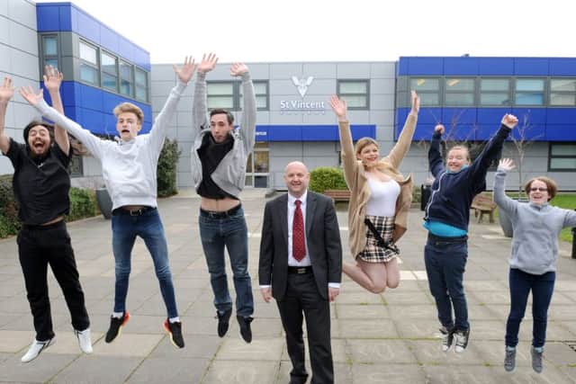 Principal Matt Atkinson with students, from left, Aristophanes Yates, Charles Flatman, Ashley Jerrard, Danielle Halsey, Nicole Ashby and Gemma Dawson
Picture: Sarah Standing (160452-4729)