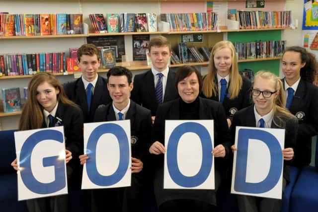 Bridgemary School in Gosport has been given a good Ofsted. From left, Brittany Davidson, Jack Hazzard, Cameron Moore, Chris Cooledge, headteacher Vicki White, Olivia Hillan, Emma Medhurst and Olivia Eldred 

Picture: Paul Jacobs (160211-1)