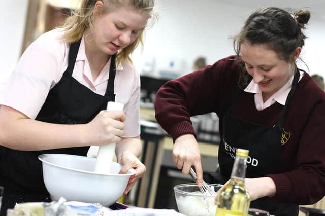 Jessica Norris and Marcy Lea, both 14, at last night's Create and Cook Bake Off at Portsmouth High School for Girls