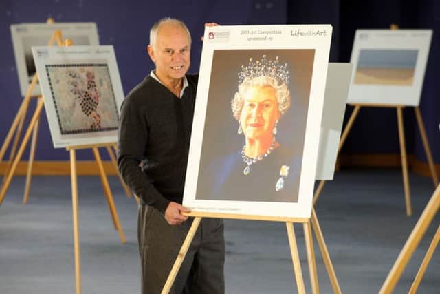 Myaware's Steve Saunders with art from the myaware art exhibition.Picture: Allan Hutchings (160147-082)