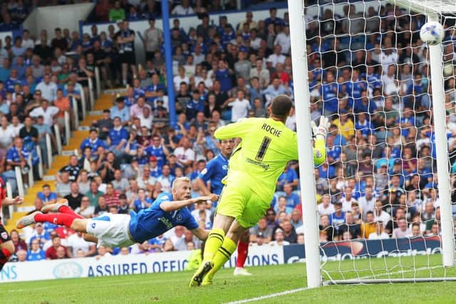 Jayden Stockley scores Pompey's late equaliser against Morecambe. Picture: Joe Pepler