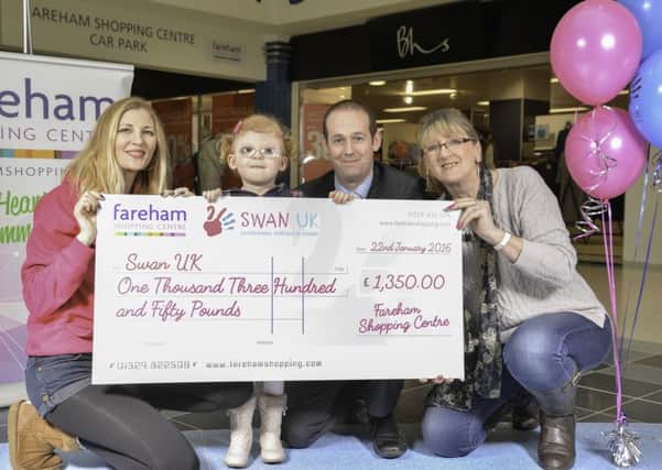 Krista Ford with her daughter Isie, Fareham shopping centre manager Mike Taylor and Sylvie Hasson the centre administrator.
Picture: Adam Rivers