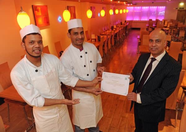 Cafe Tusk chefs Anam Uddin, Pinak Kantideb and proprietor Ahmed Mosud.
Picture: Ian Hargreaves  (160338-1)
