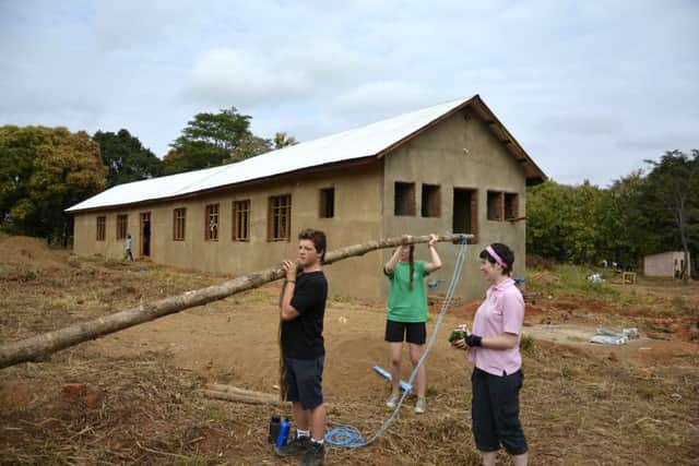 Scouts lead by Kieran Brackley (left) built a medical centre during the 2015 expedition to Tanzania.