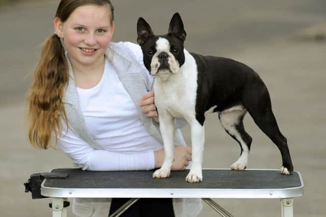 Charlie-Lou Quick, nine, from Leigh Park with her dog Mia, a Boston Terrier Picture: Malcolm Wells (160304-7606)