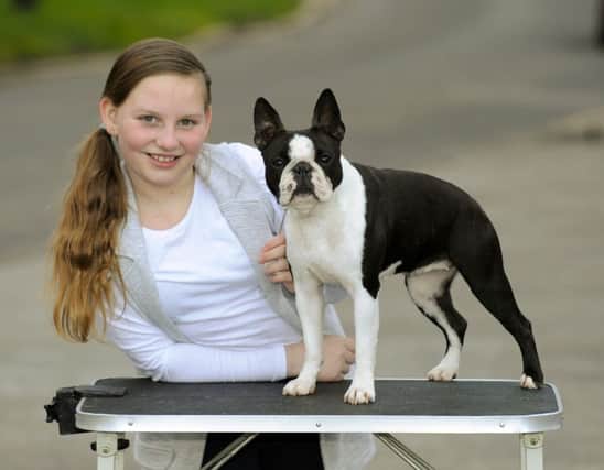 Charlie-Lou Quick, nine, from Leigh Park with her dog Mia, a Boston Terrier 

Picture: Malcolm Wells (160304-7606)
