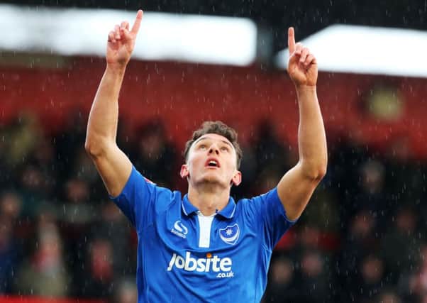 Kal Naismith signals skywards after netting his first goal for Pompey. Picture: Joe Pepler