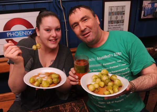 Katie Rogers and Steven Hendry at The Phoenix in Southsea for the sprout eating event in aid of the Return To Normandy charity 
Picture: Ian Hargreaves (160343-2)