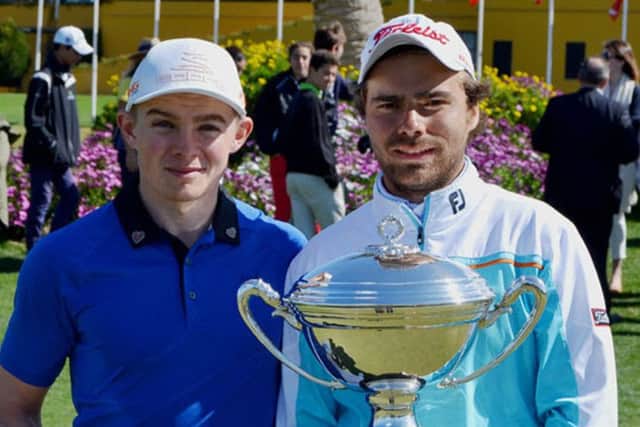 Scott Gregory, left, with winner Romain Langasque. Picture: Adolfo Juan Luna
