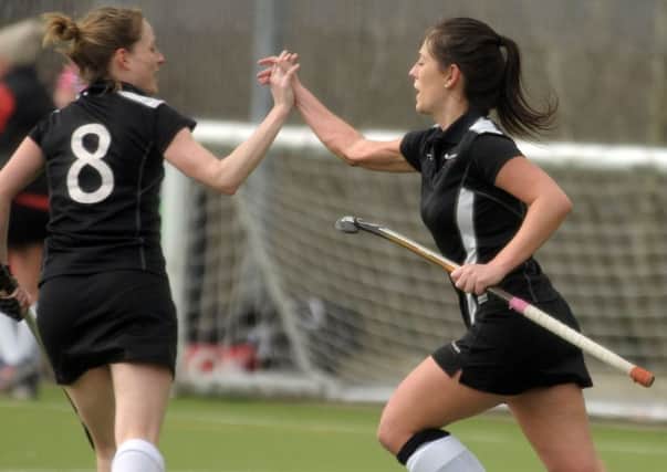 Emma Jones, right, celebrates with Victoria Field after scoring in the 3-3 draw with Wanderers at the weekend