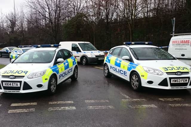 Police near Tesco petrol garage at North Harbour in Portsmouth where a body was found