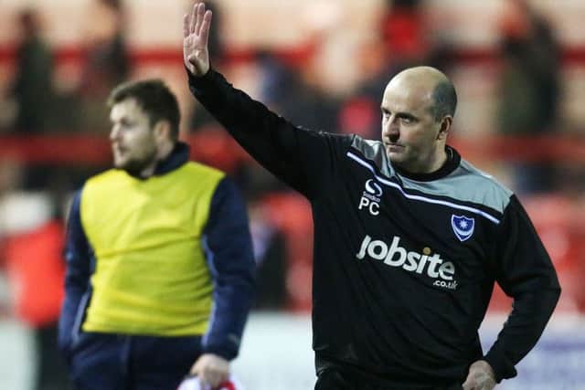 Paul Cook salutes the Pompey fans. Picture: Joe Pepler