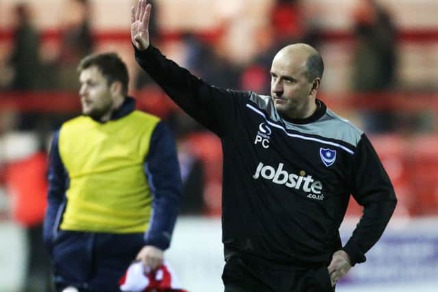 Paul Cook salutes the Pompey fans. Picture: Joe Pepler