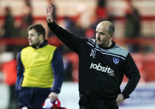 Paul Cook salutes the Pompey fans. Picture: Joe Pepler