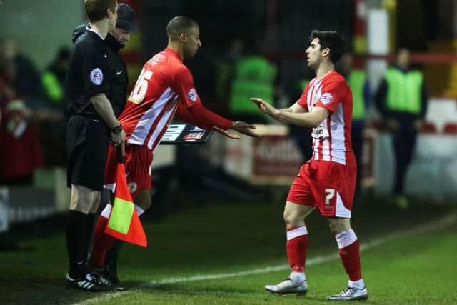 Rommy Boco, centre, appeared as a substitute for Accrington last night to Pompey manager Paul Cooks dismay   Picture: Joe Pepler