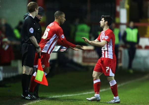 Rommy Boco, centre, appeared as a substitute for Accrington last night to Pompey manager Paul Cooks dismay   Picture: Joe Pepler