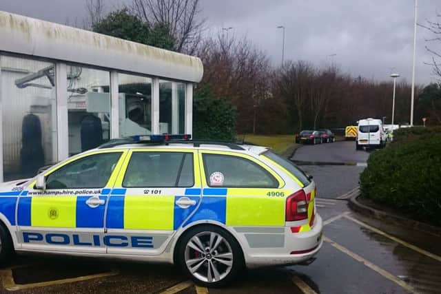 Police near Tesco petrol garage at North Harbour in Portsmouth where a body was found