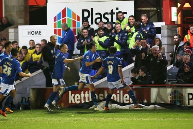 Michael Doyle celebrates his goal at Accrington in front of Pompey's dugout Picture: Joe Pepler