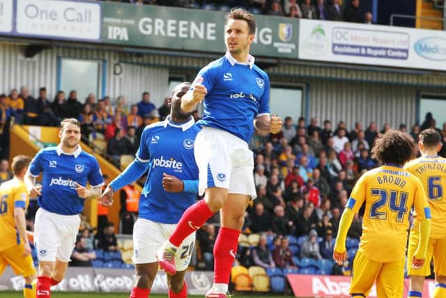 Matt Tubbs celebrates after opening the scoring on Pompey's last visit to Mansfield. Picture: Joe Pepler