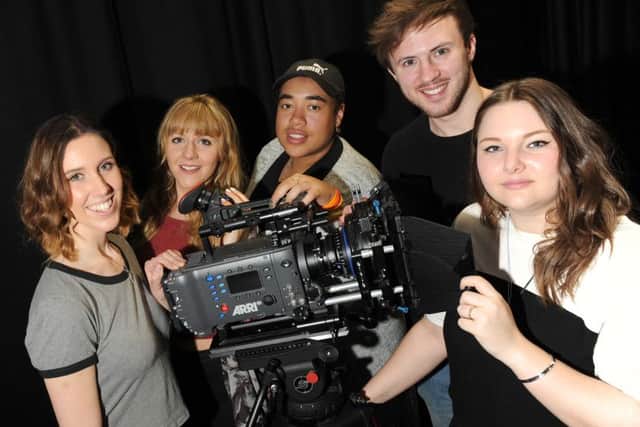 FILM-MAKERS Clockwise from left: Rachael Sutton, Josie Downing, Naomi Luckhoo, Dan Bevan and Matilda Dray. Left, Lemel and Groening meet over a game of chess. Picture: Sarah Standing 160509-7028