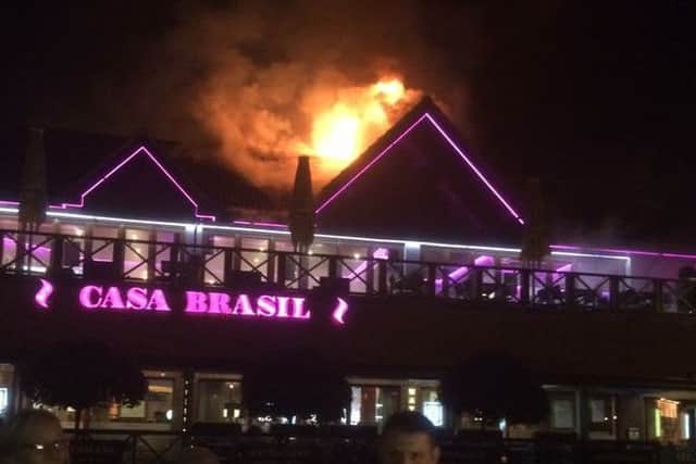 Customers were evacuated from the restaurant when the blaze erupted in the roof of the building   PHOTO: Keith Hooper