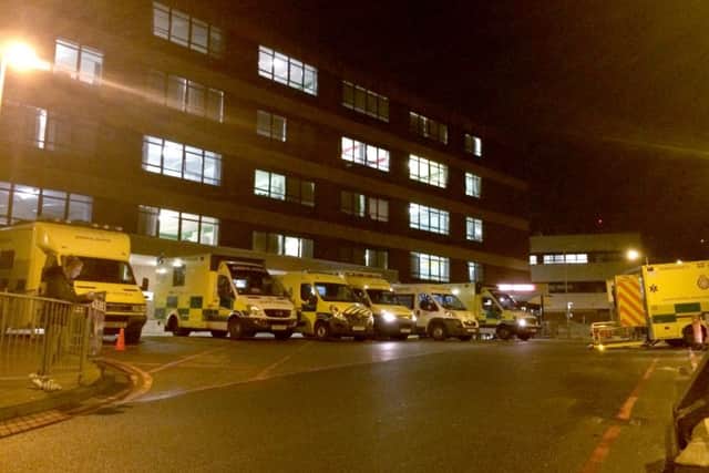 Ambulances queuing outside QA hospital last month