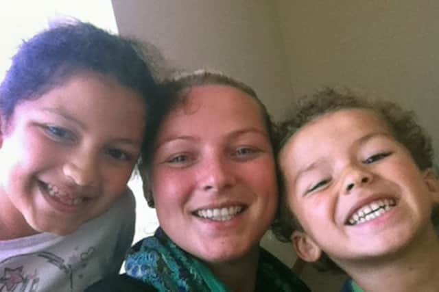 Lacey Plato with children
Aishah & Faris