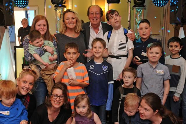 Charlie Brooks and Fred Dinenage with some of the children
Picture Ian Hargreaves (160353-9)