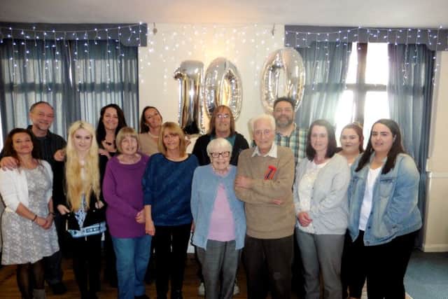 SPRIGHTLY Centenarian Francis Pony Moore celebrates with his wife Eve, surrounded by their family                                                                              Pictures: Shiny Images