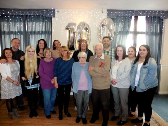 SPRIGHTLY Centenarian Francis Pony Moore celebrates with his wife Eve, surrounded by their family                                                                              Pictures: Shiny Images