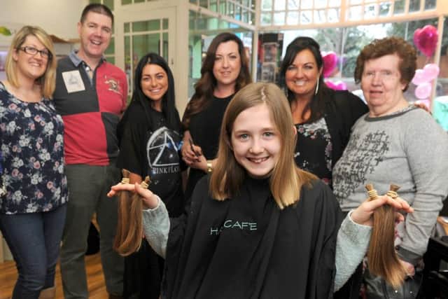 HAIR YOU GO Molly Dyson had seven inches of her hair cut off in aid of charity