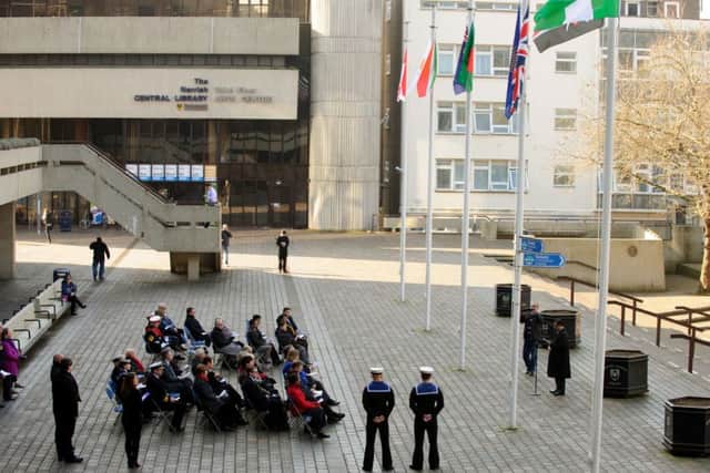 The Commonwealth Flag is raised in Guildhall Square as part of international celebrations to mark Commonwealth Day Picture: Allan Hutchings (160396-188)
