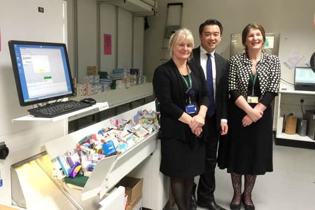 Alan Mak MP with Amanda Cooper and Jacquie Bower from the pharmacy at Queen Alexandra Hospital's pharmacy