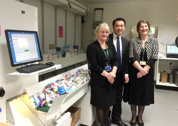 Alan Mak MP with Amanda Cooper and Jacquie Bower from the pharmacy at Queen Alexandra Hospital's pharmacy