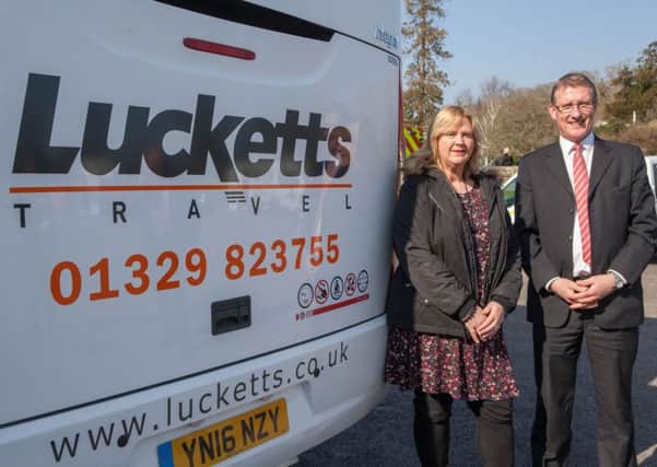 L-R Rachael Burton, widow of M27 crash victim Kevin Burton, and Paul Barringer of Lucketts Travel, which is supporting new road safety campaign Project Pictogram